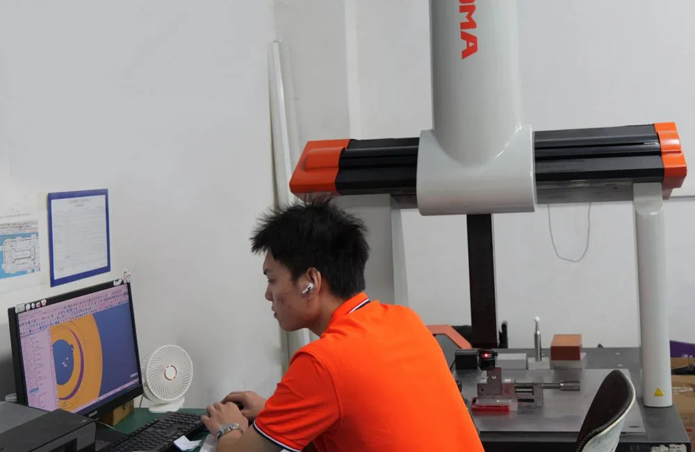 VOGUC technician performing CMM inspection