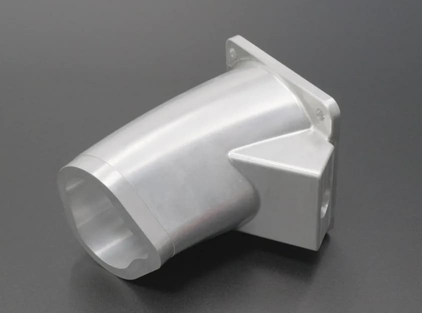 Angled duct adapter housing machining example