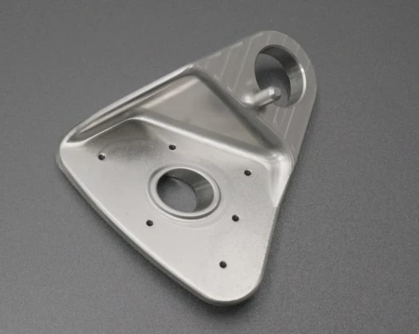 Triangular titanium mounting plate machining example