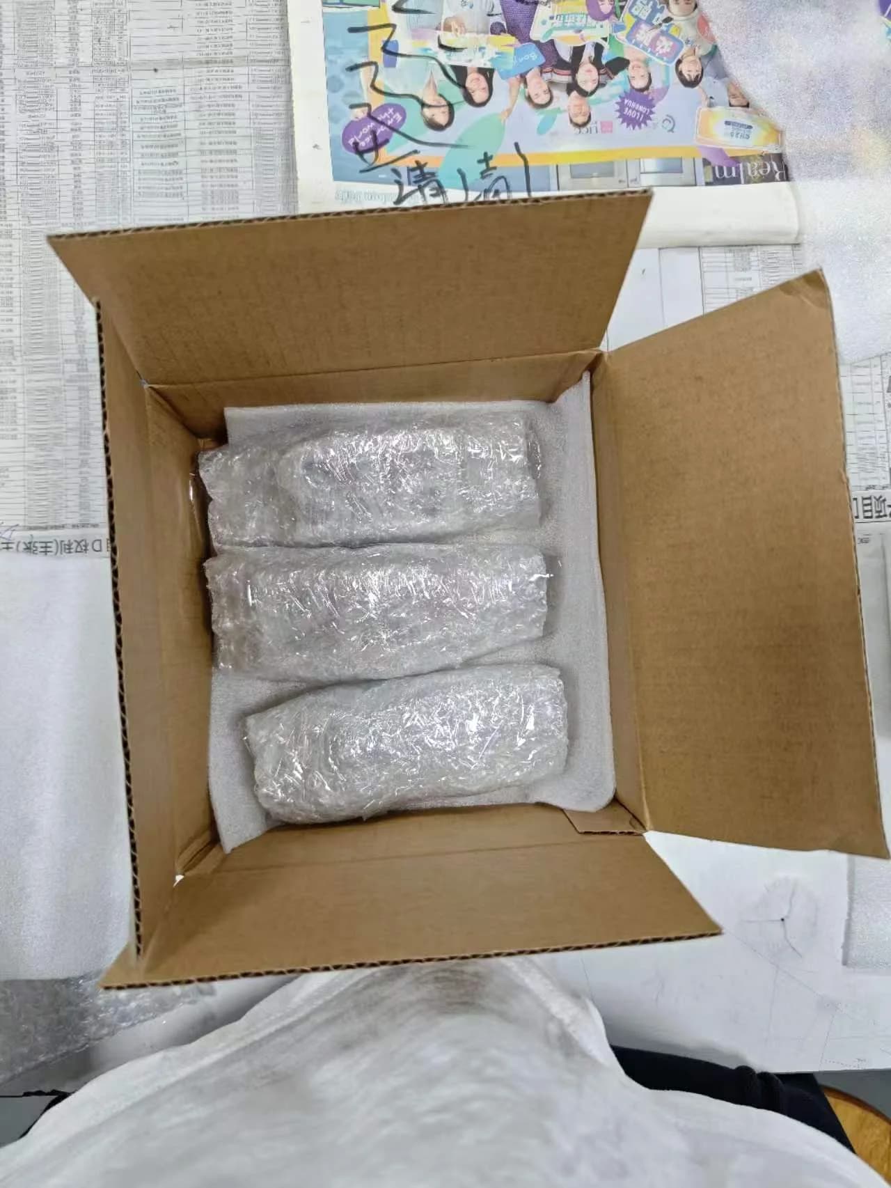 Separated wrapped CNC parts in export packaging